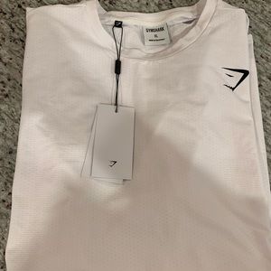 Men’s Gymshark white Arrival shirt